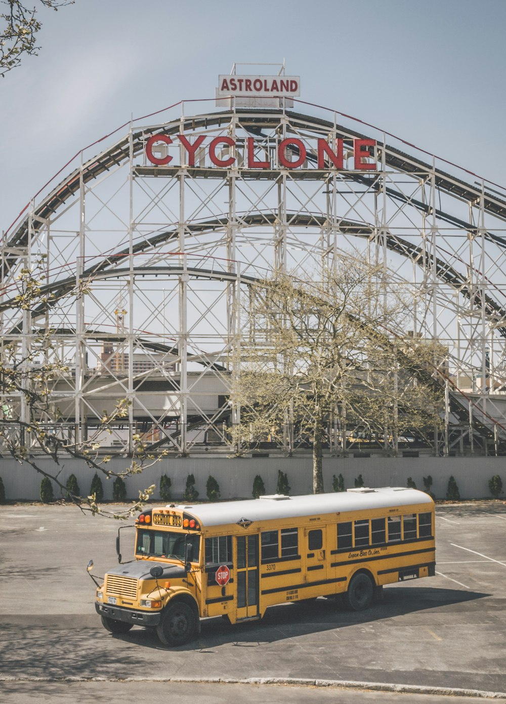 yellow school bus on road during daytime