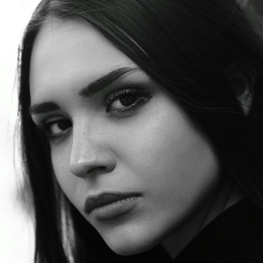 woman in black shirt with white background