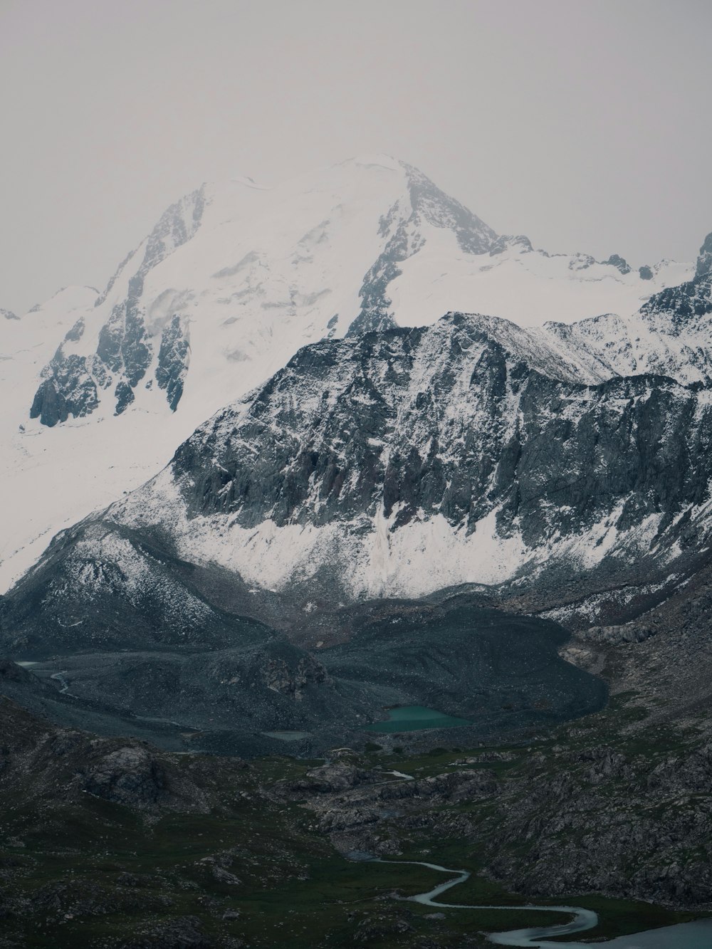 snow covered mountain during daytime