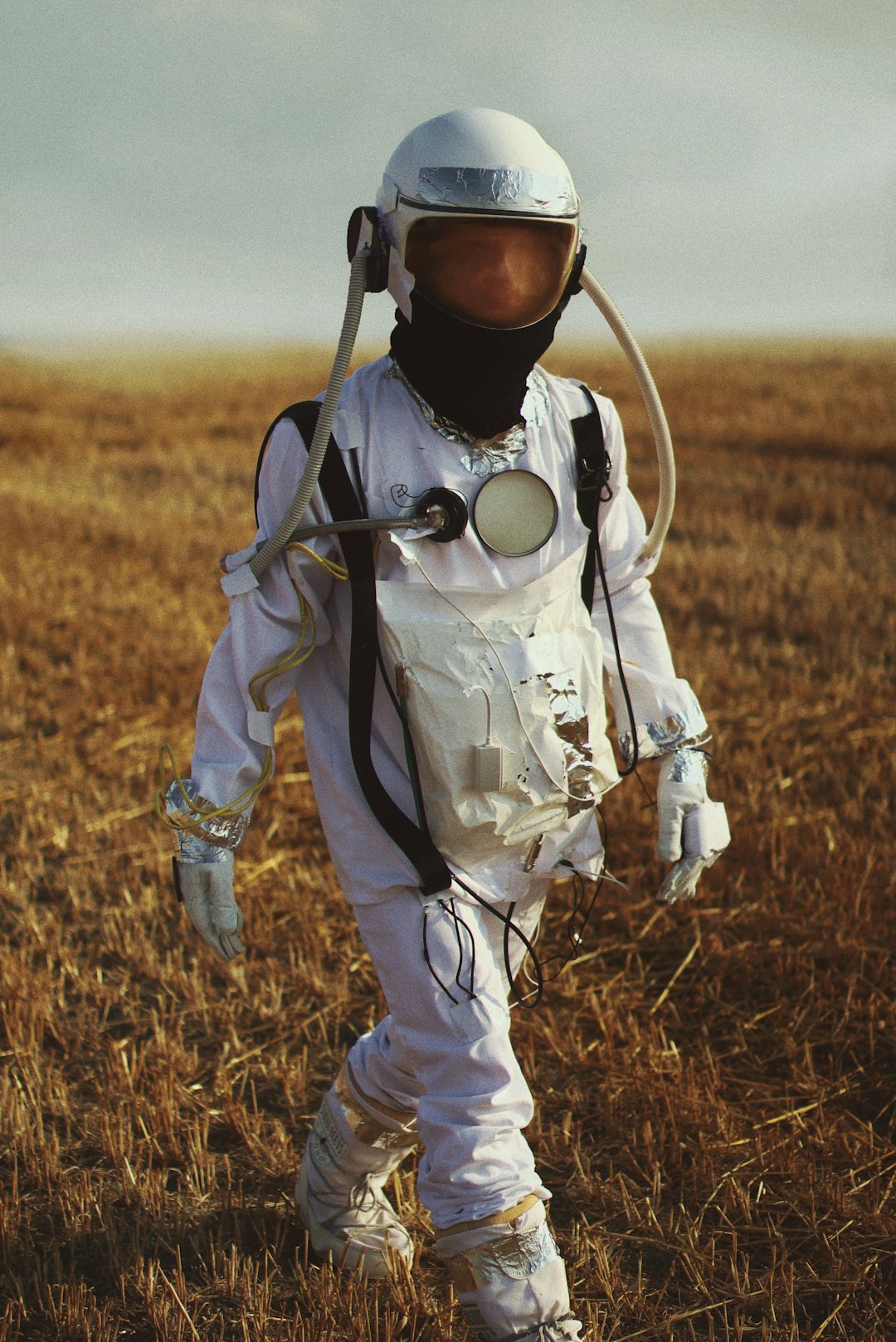 man in white and black long sleeve shirt and pants wearing black helmet