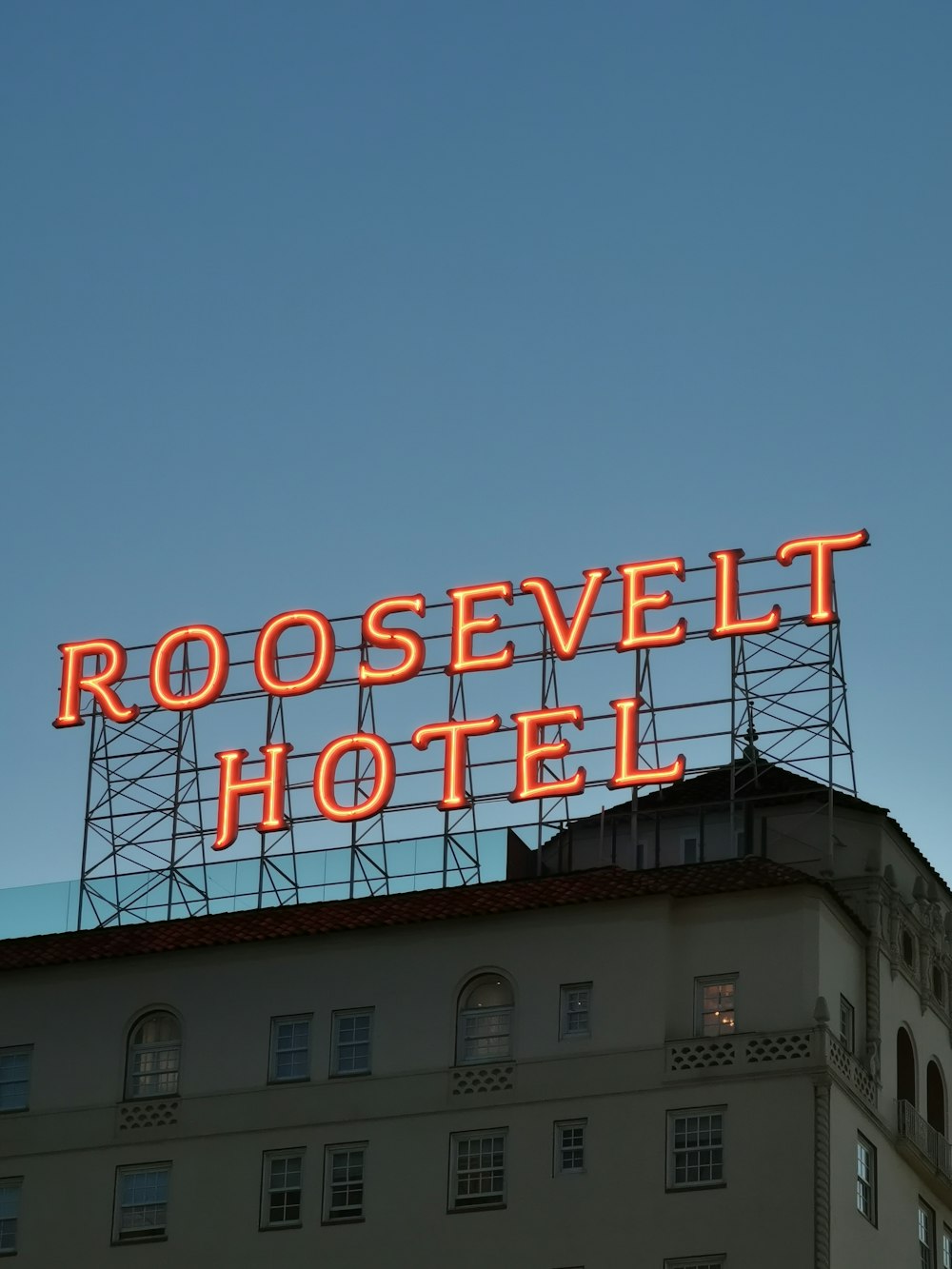 red and white UNKs neon light signage