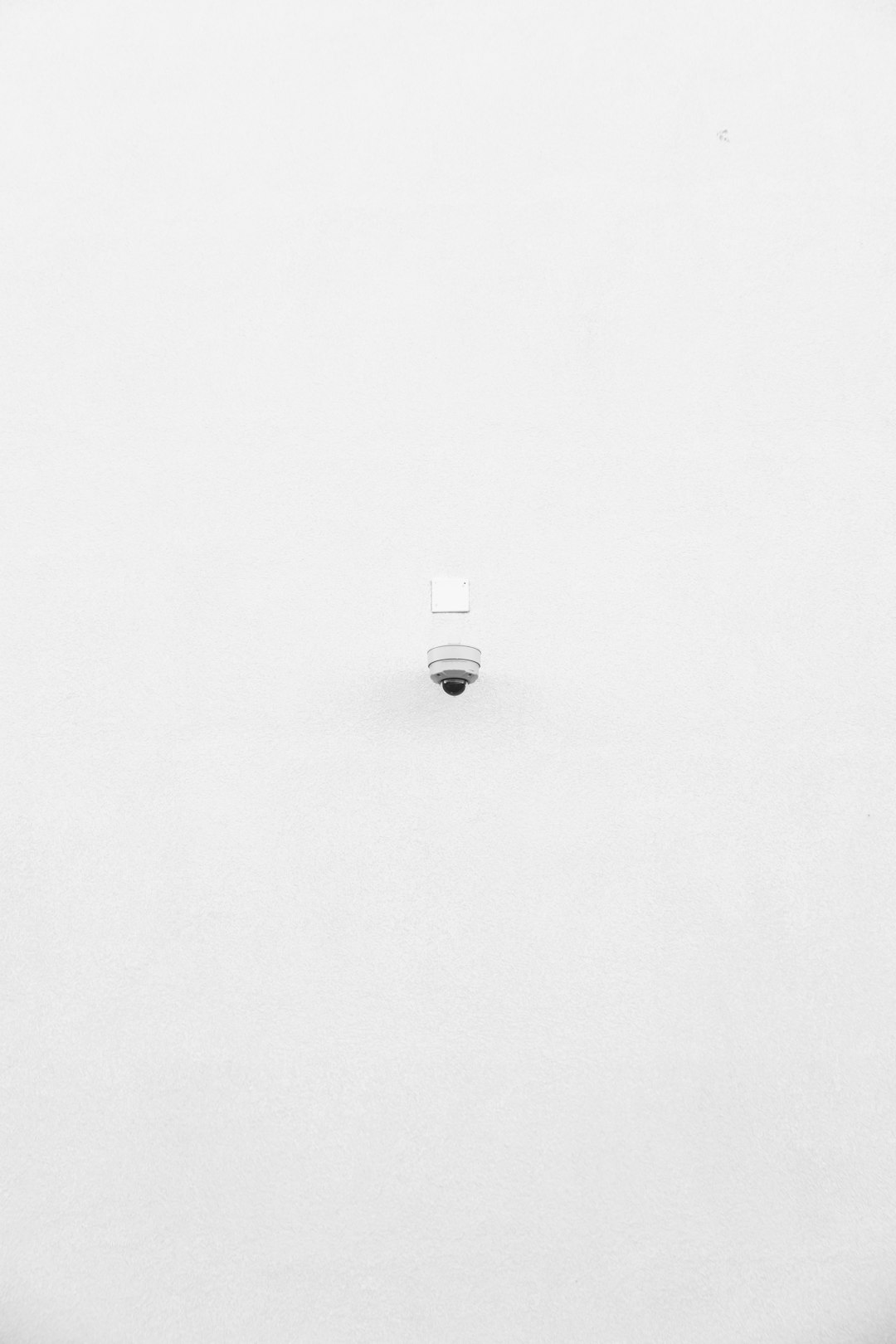 white round device on white surface