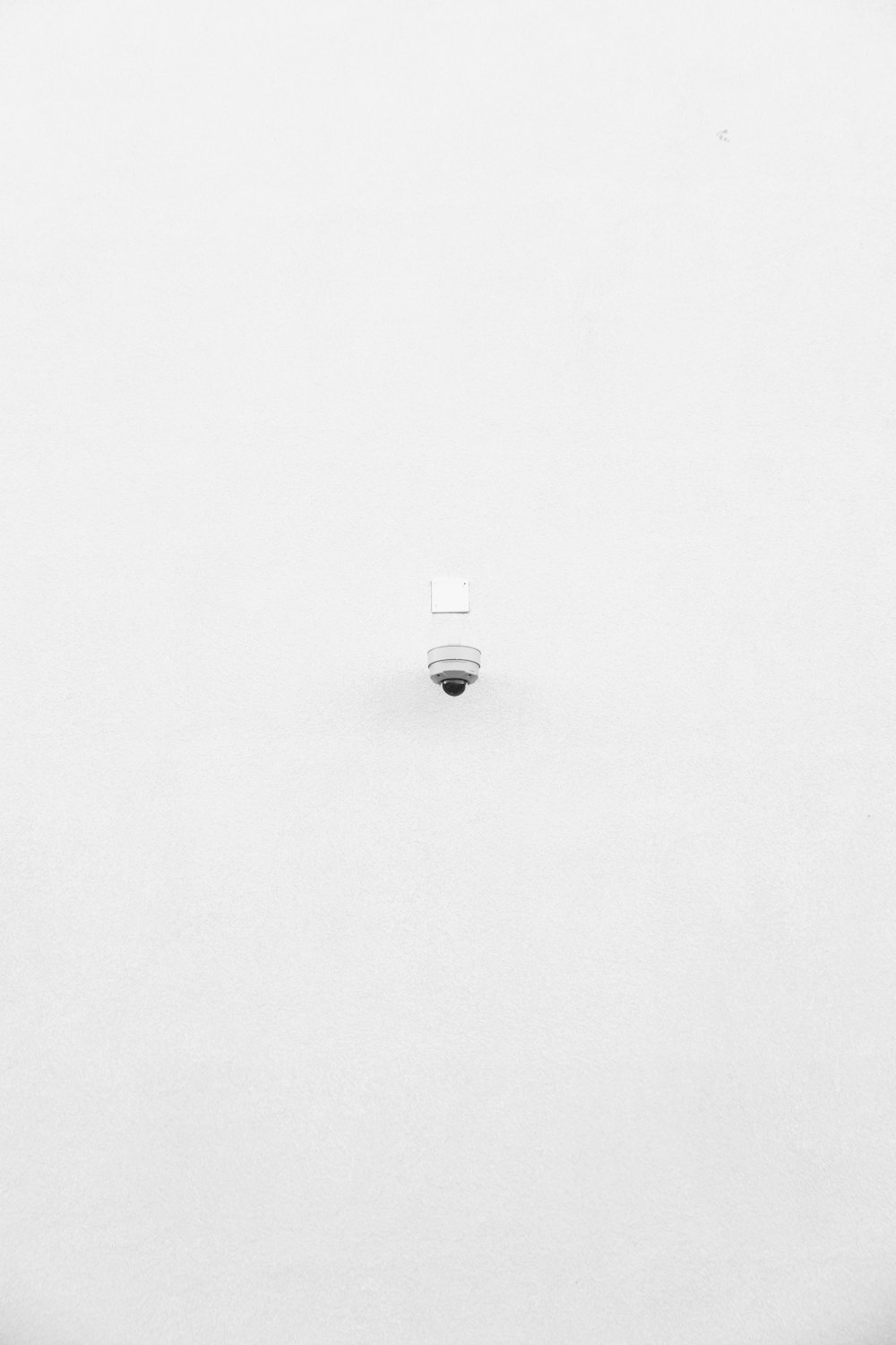 white round device on white surface