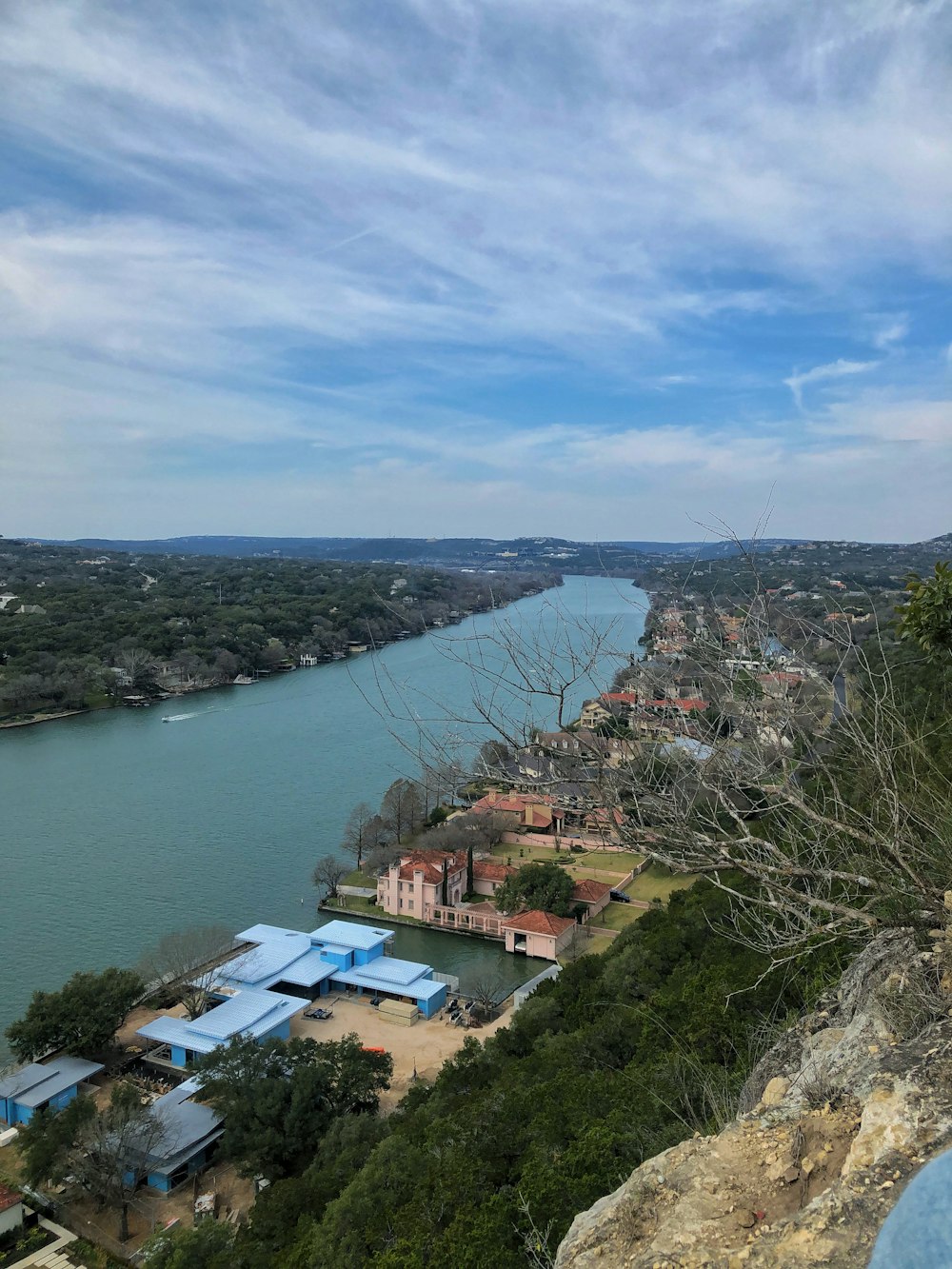 aerial view of city near body of water during daytime