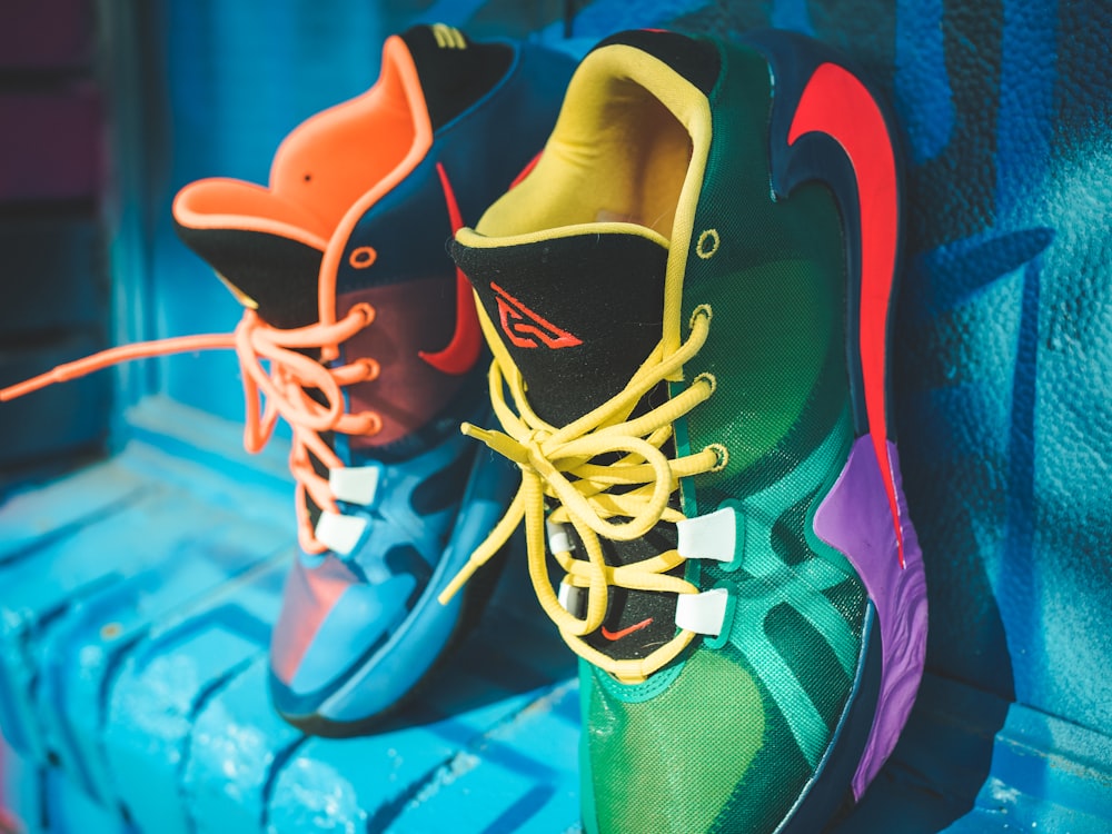 green and orange nike basketball shoes