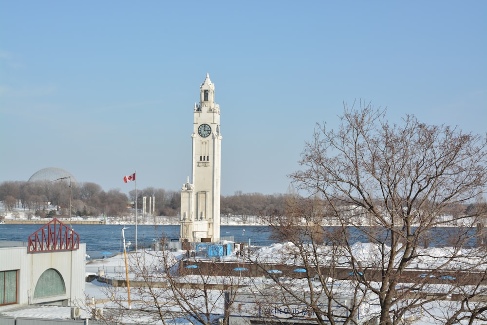 white concrete building near body of water during daytime