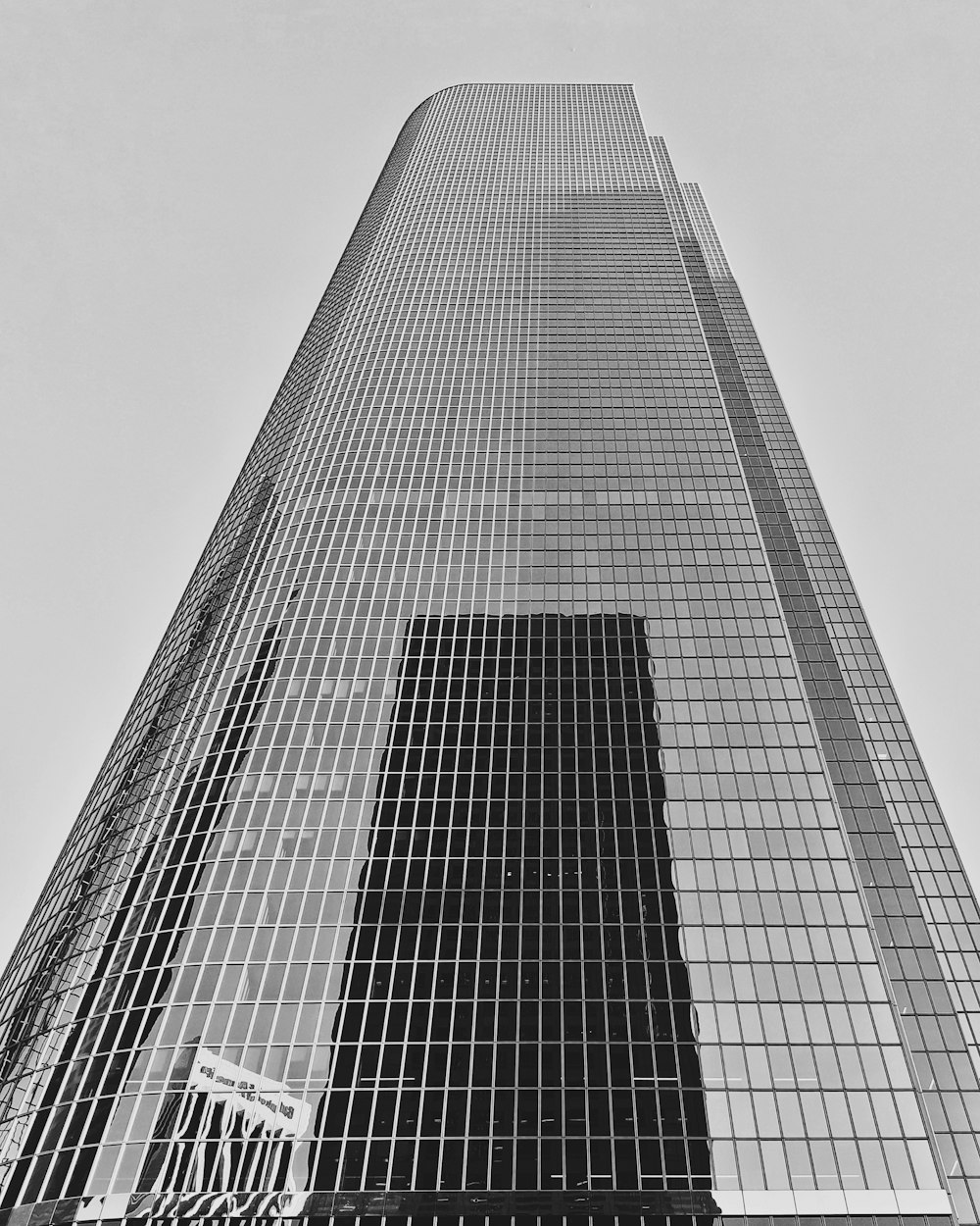 grayscale photo of high rise building