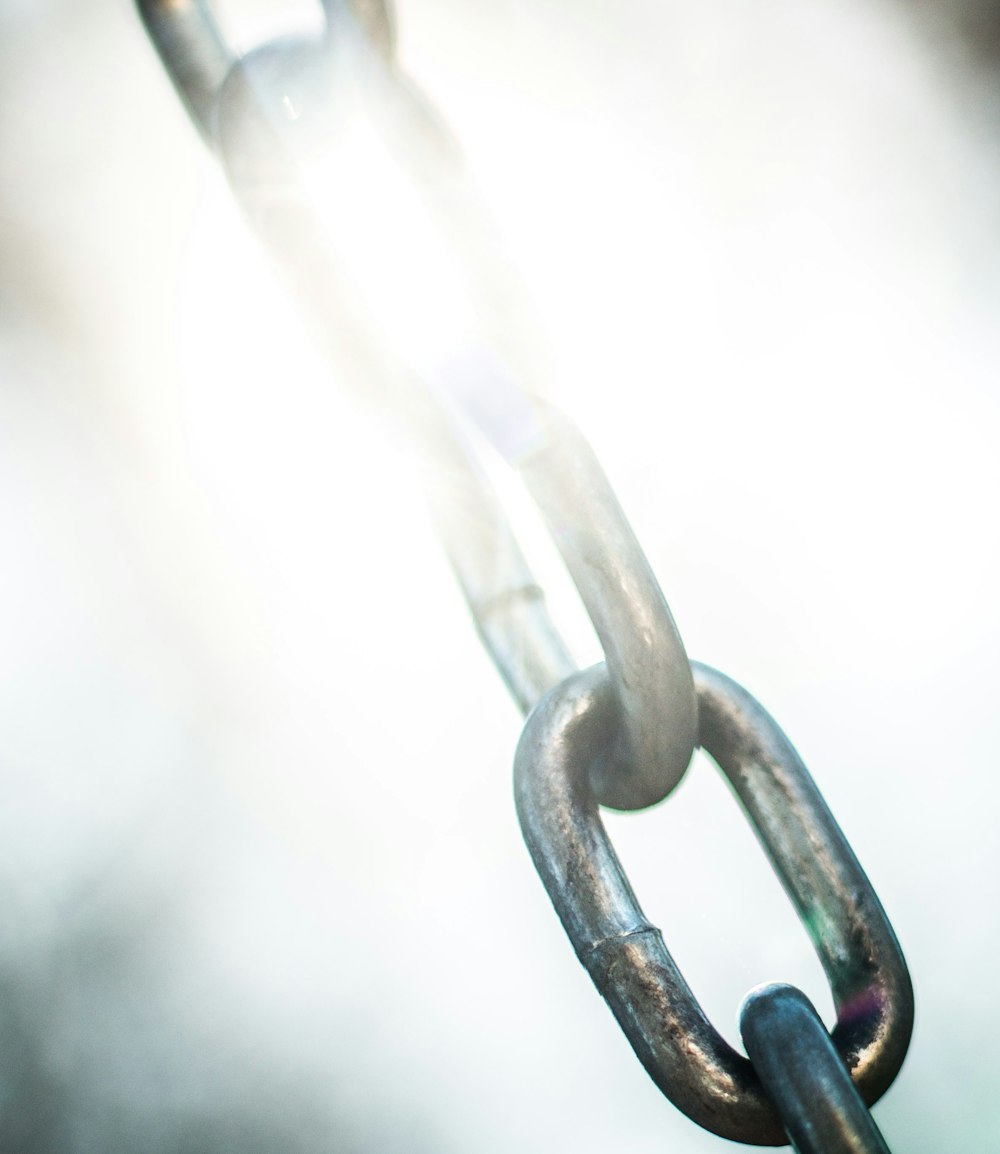 grey metal chain in close up photography