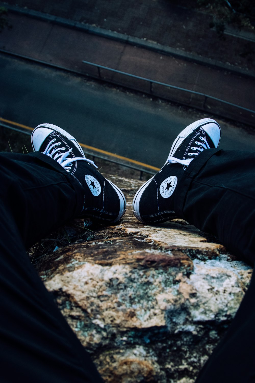 Person in black pants wearing black and white converse all star high tops  photo – Free Australia Image on Unsplash