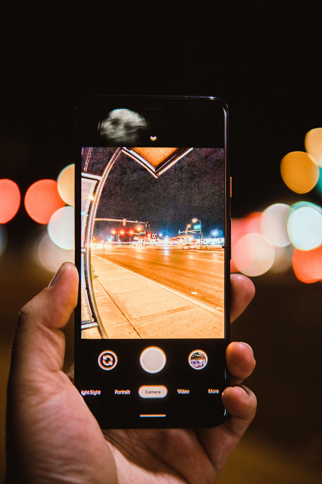 person holding black iphone 4