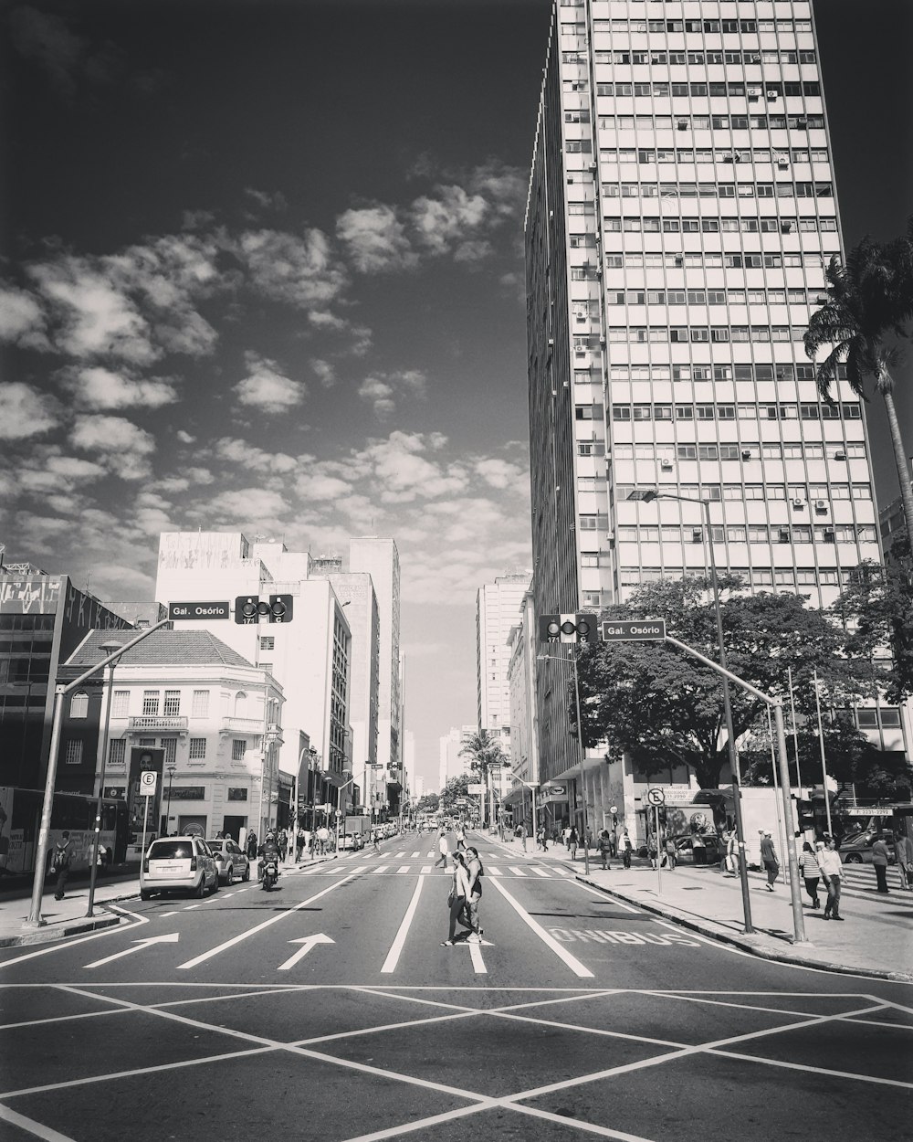 grayscale photo of city buildings