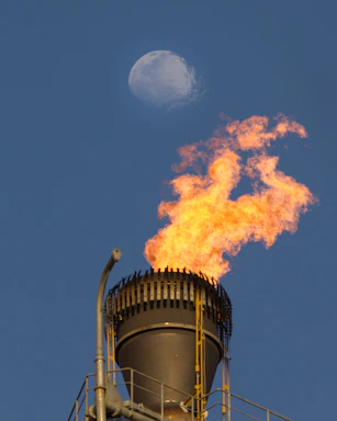 fire in gray steel tank