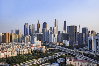 city buildings under blue sky during daytime