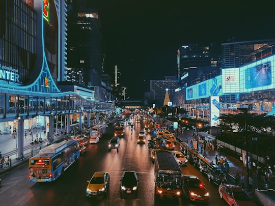 cars on road during night time in Pathum Wan District Thailand