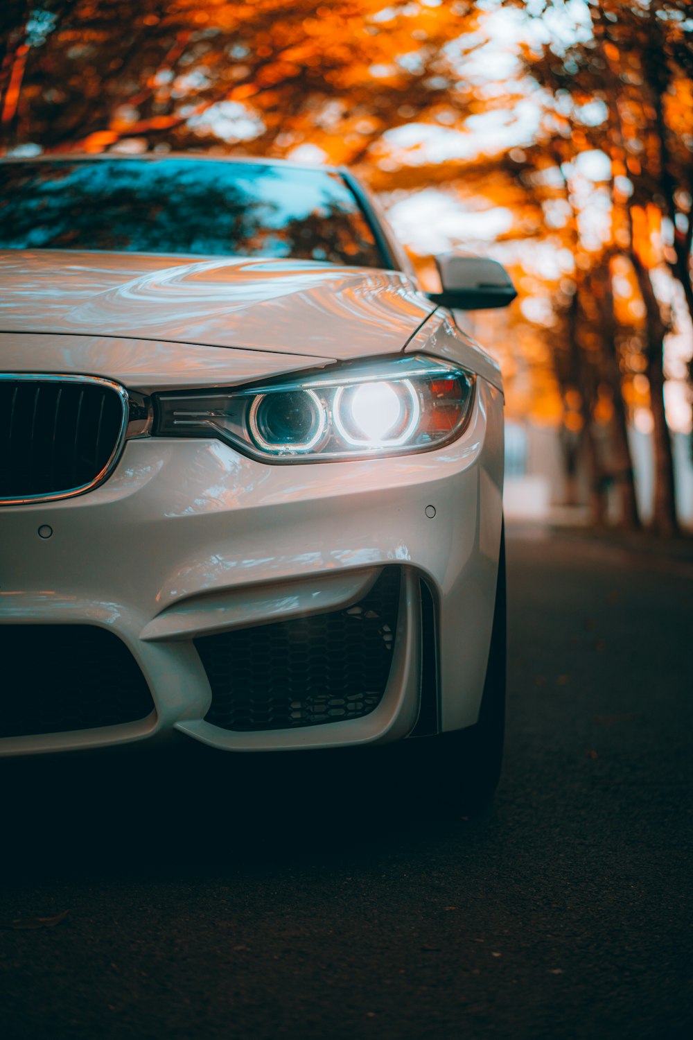 white mercedes benz car on road during daytime