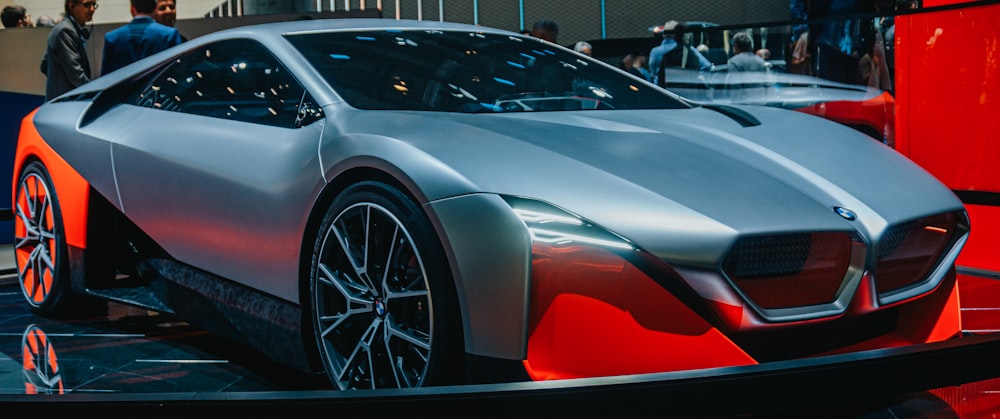 silver and red car in a parking lot photo – Free Iaa frankfurt Image on  Unsplash