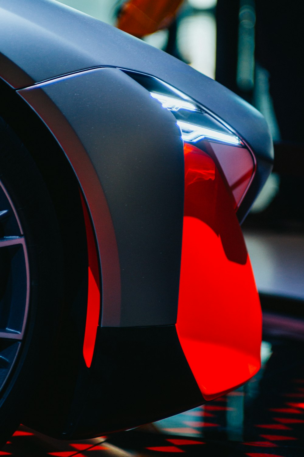 red and black car in close up photography