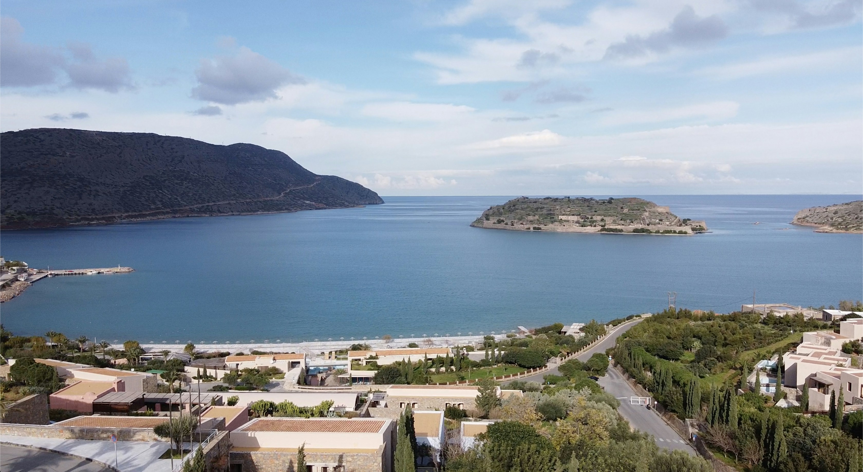 aerial view of city near body of water during daytime