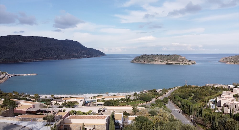 aerial view of city near body of water during daytime