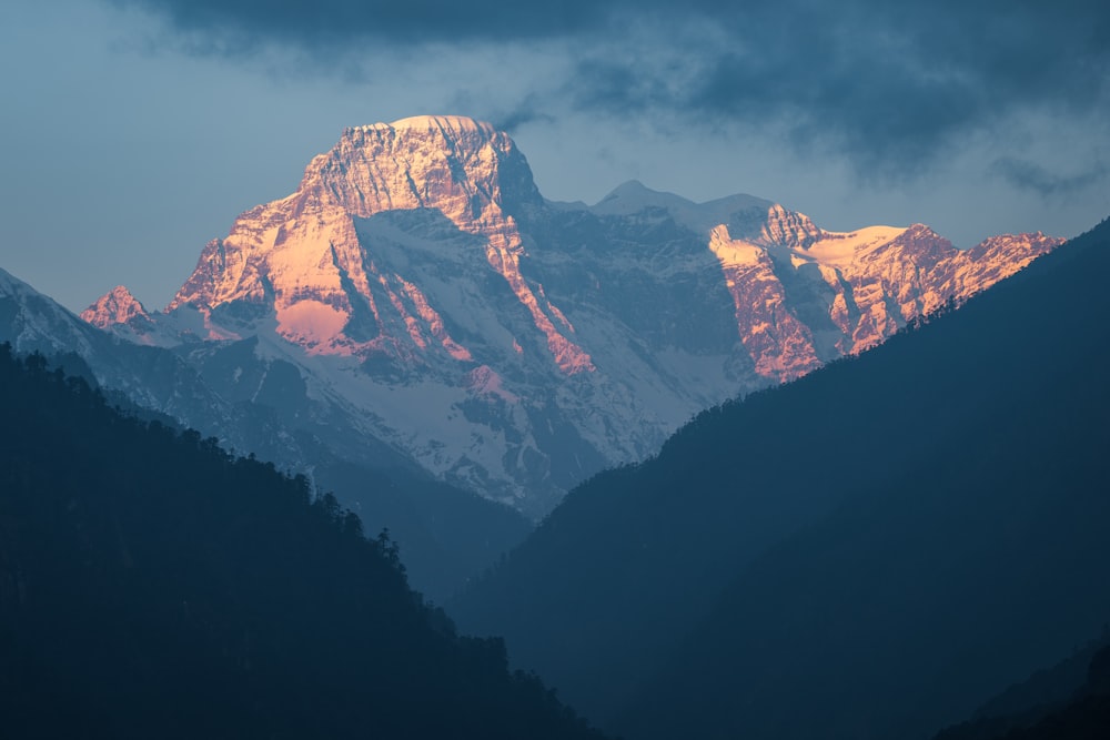 snow covered mountain during daytime