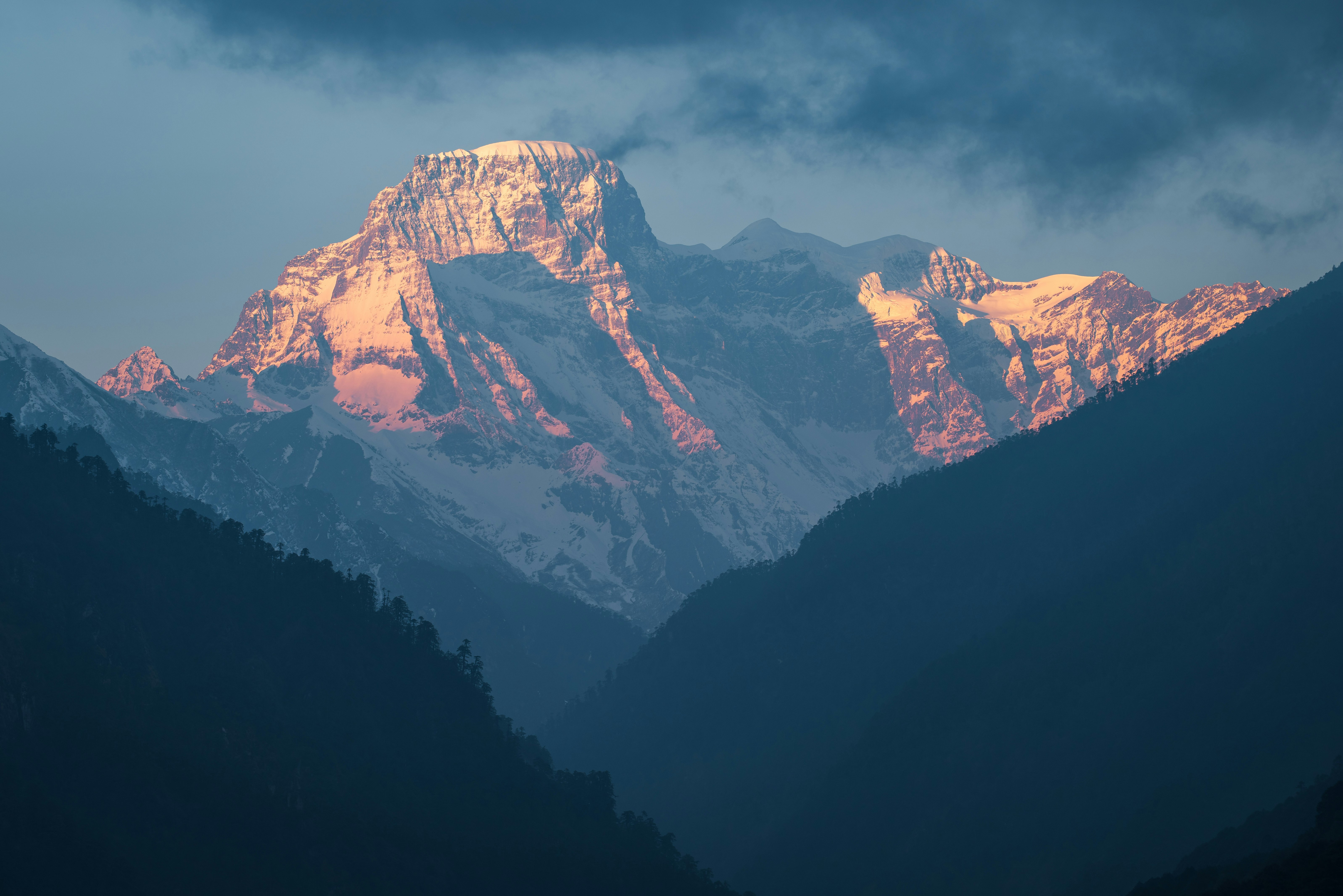 snow covered mountain during daytime