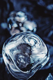 Close-up of a Sweet Puff pipe showcasing its clear, flawless borosilicate glass surface.