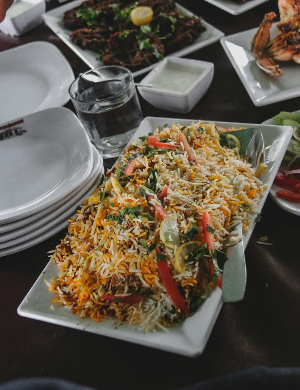 white ceramic plate on stainless steel tray