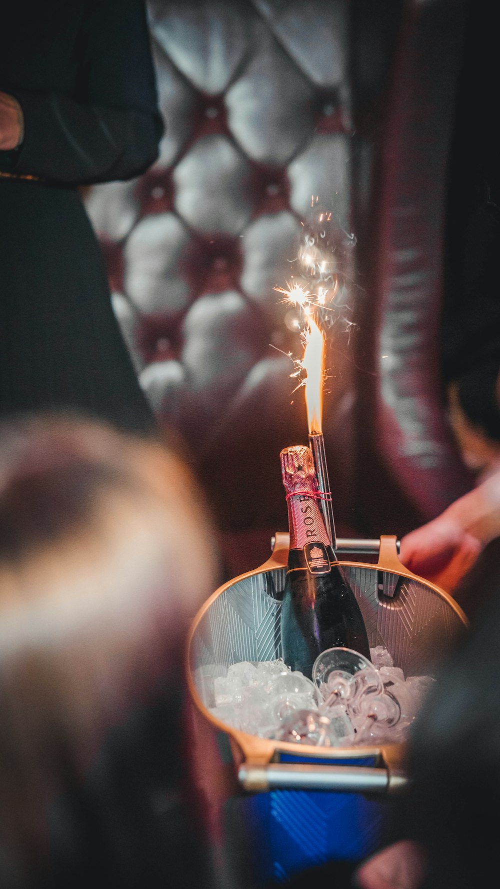 man in black shirt holding fire cracker