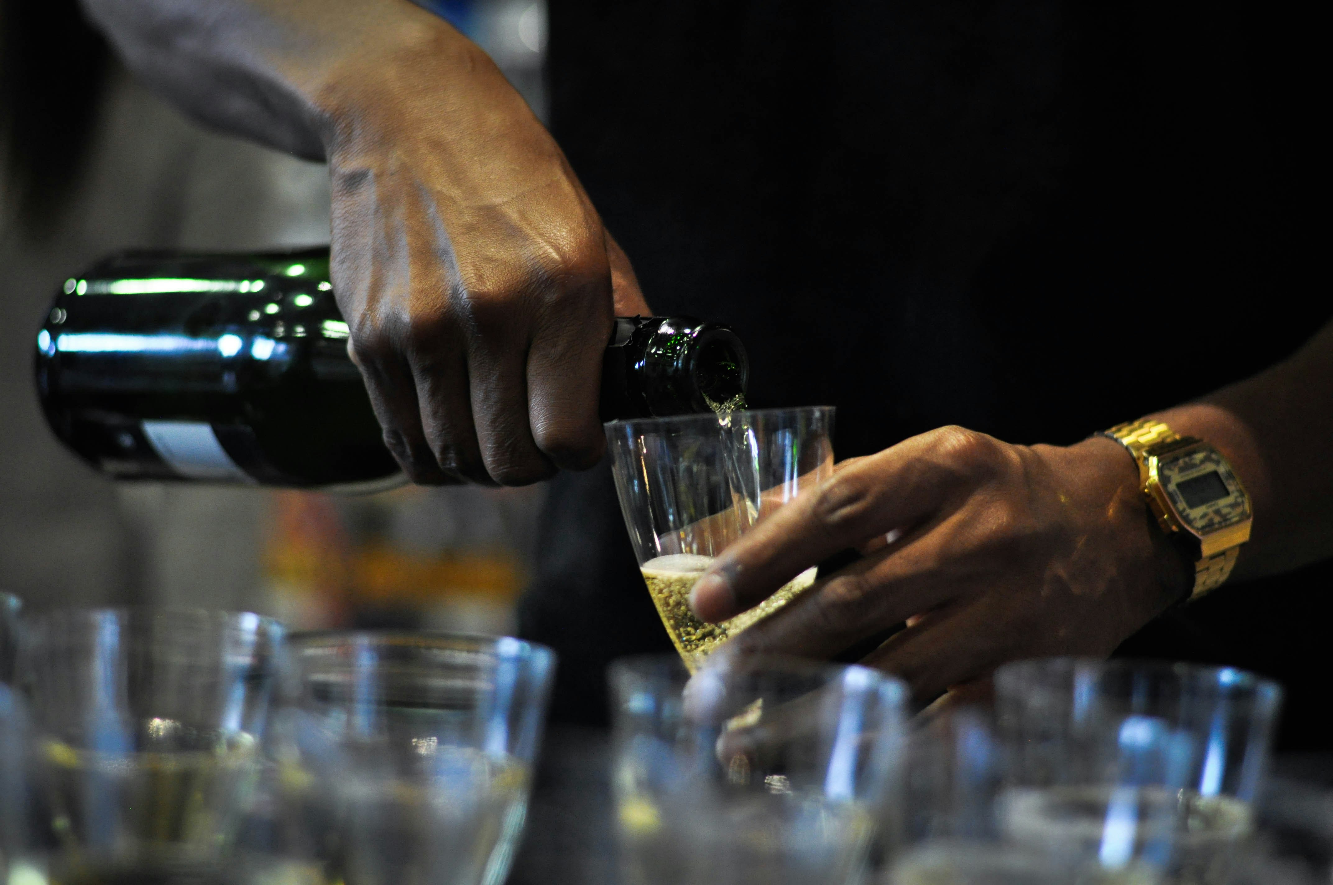 woman wearing yellow long-sleeved dress under white clouds and blue sky during daytime