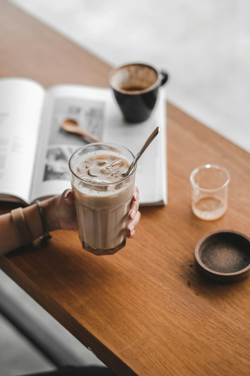 clear drinking glass with brown liquid