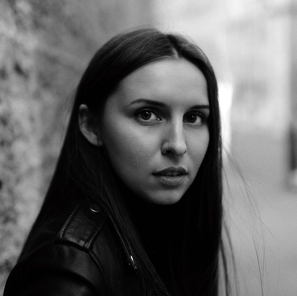 woman in black leather jacket