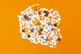 white and orange medication pill