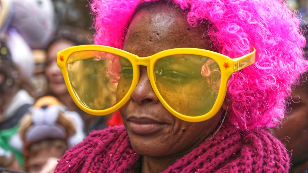 woman in yellow framed sunglasses