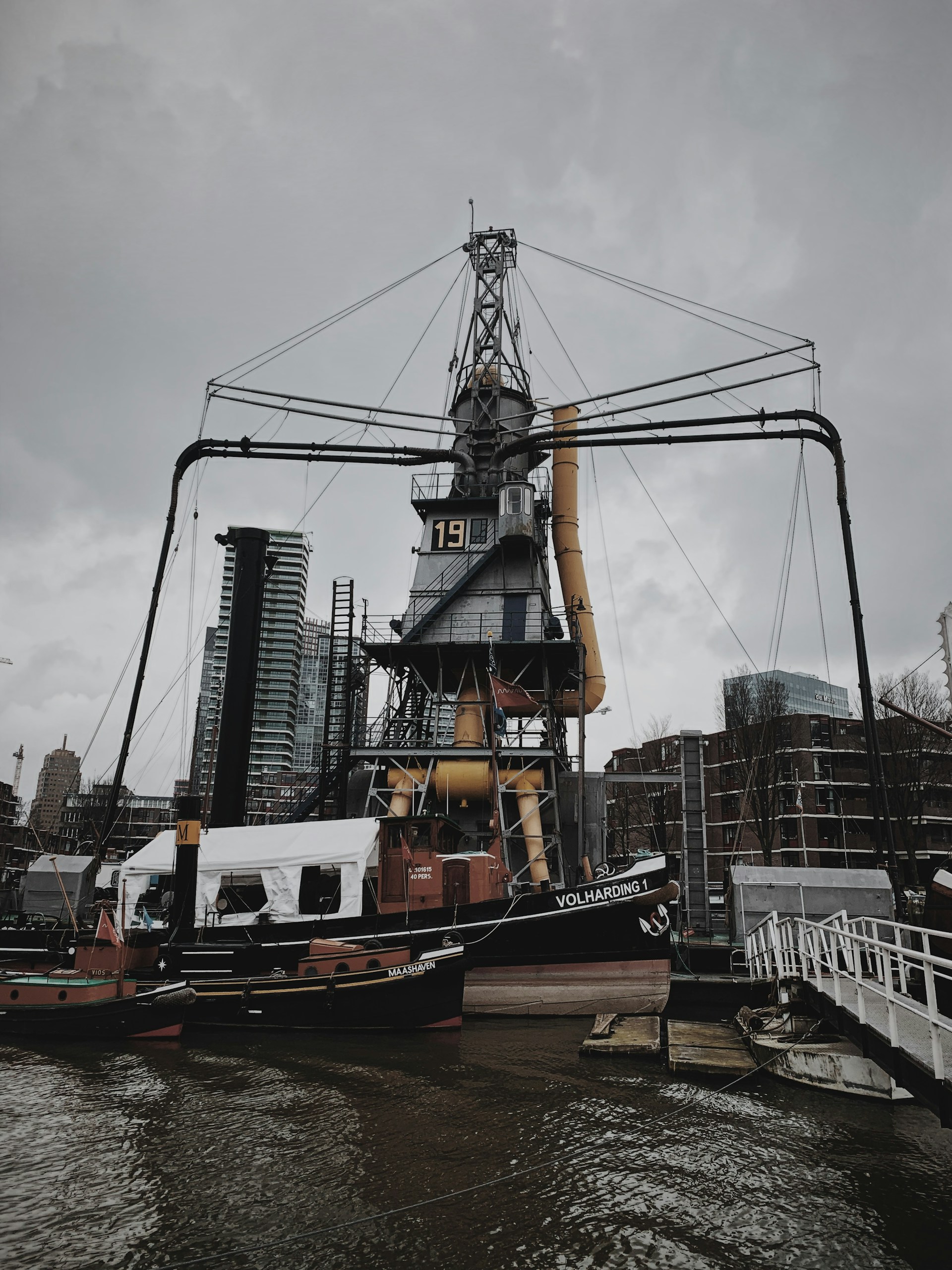black and brown leather padded tub sofa