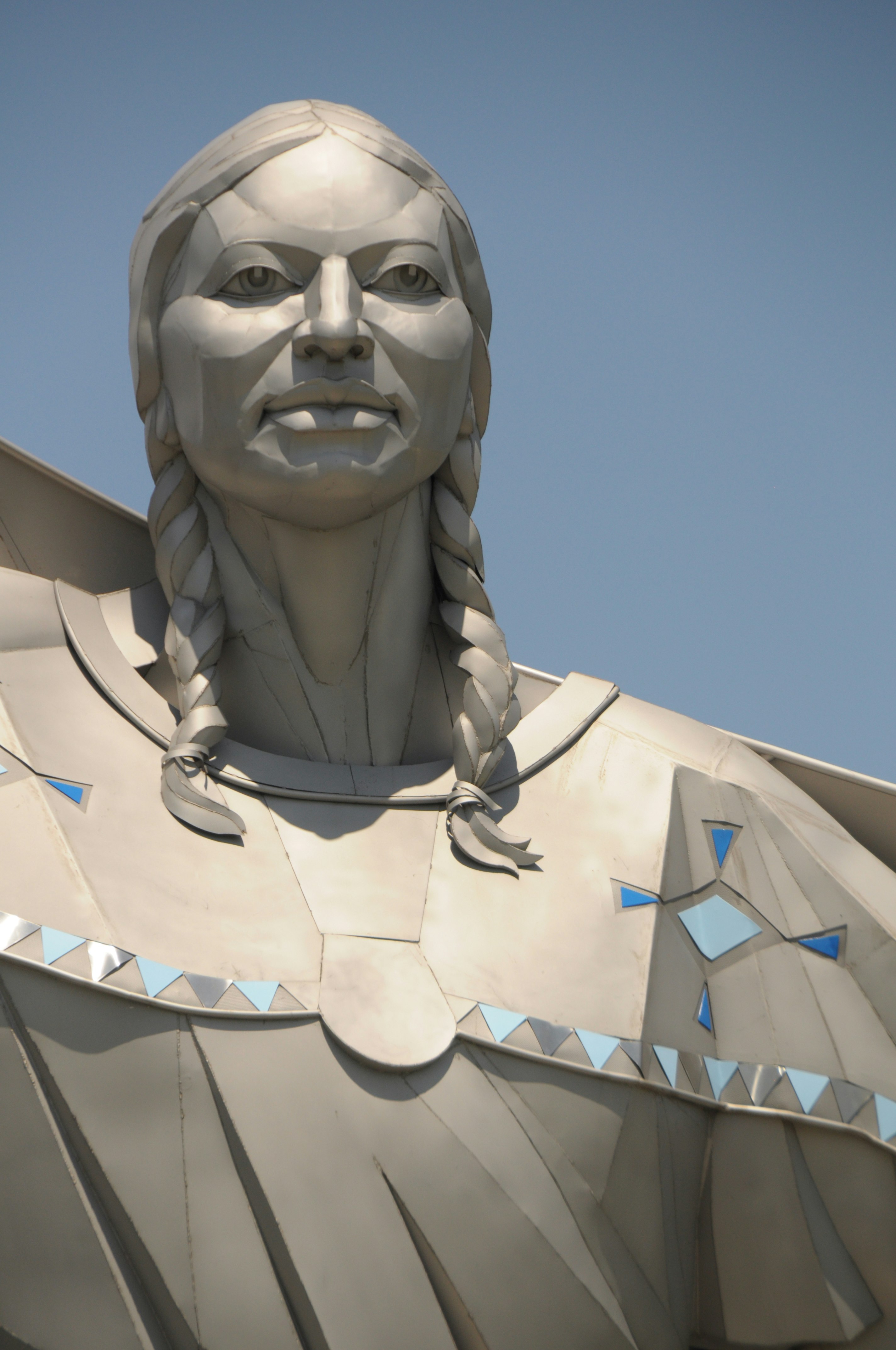 DIGNITY statue closeup Native American Indian Sioux woman star quilt sculpture Dale Lamphere sunset South Dakota Missouri River overlook