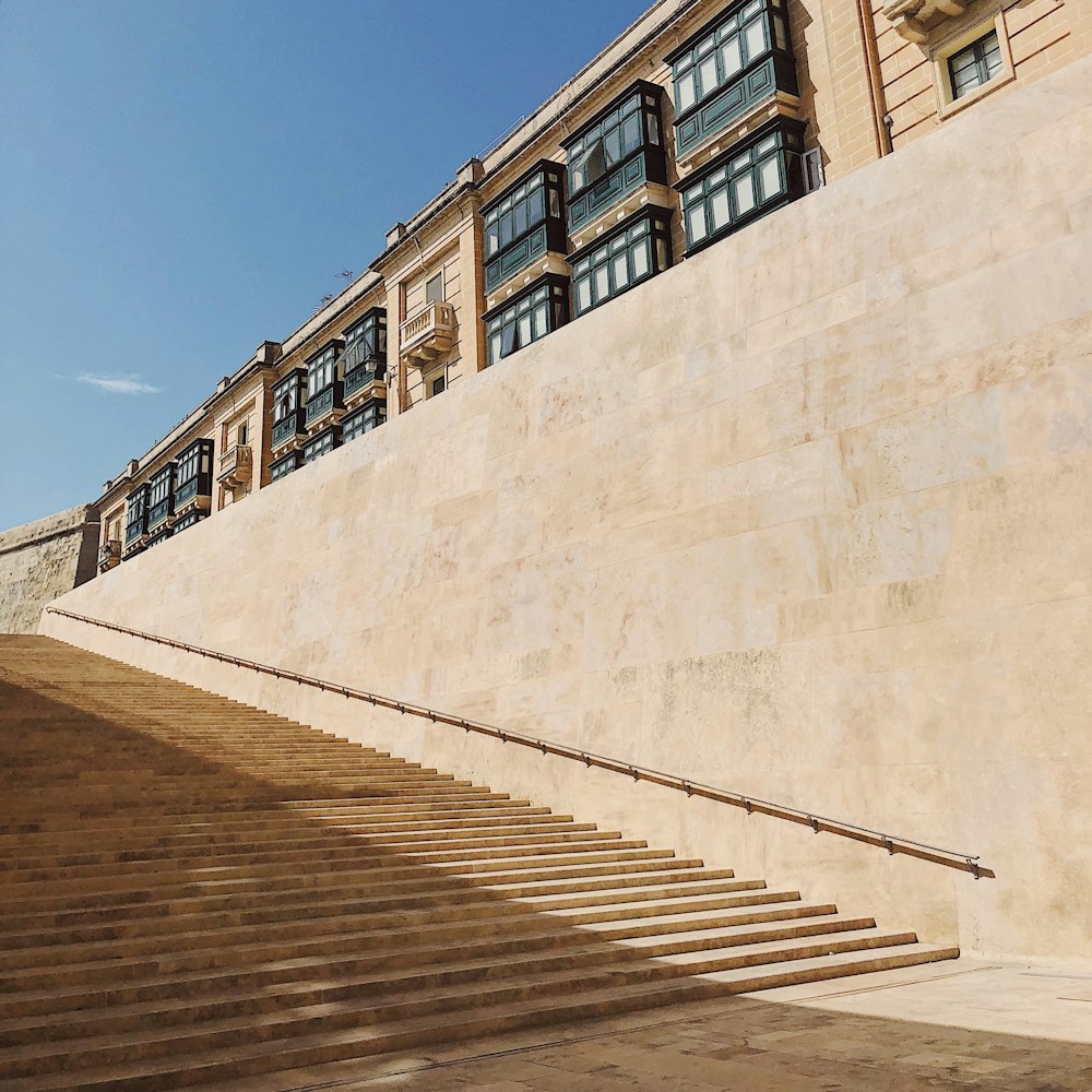 brown concrete building under blue sky during daytime