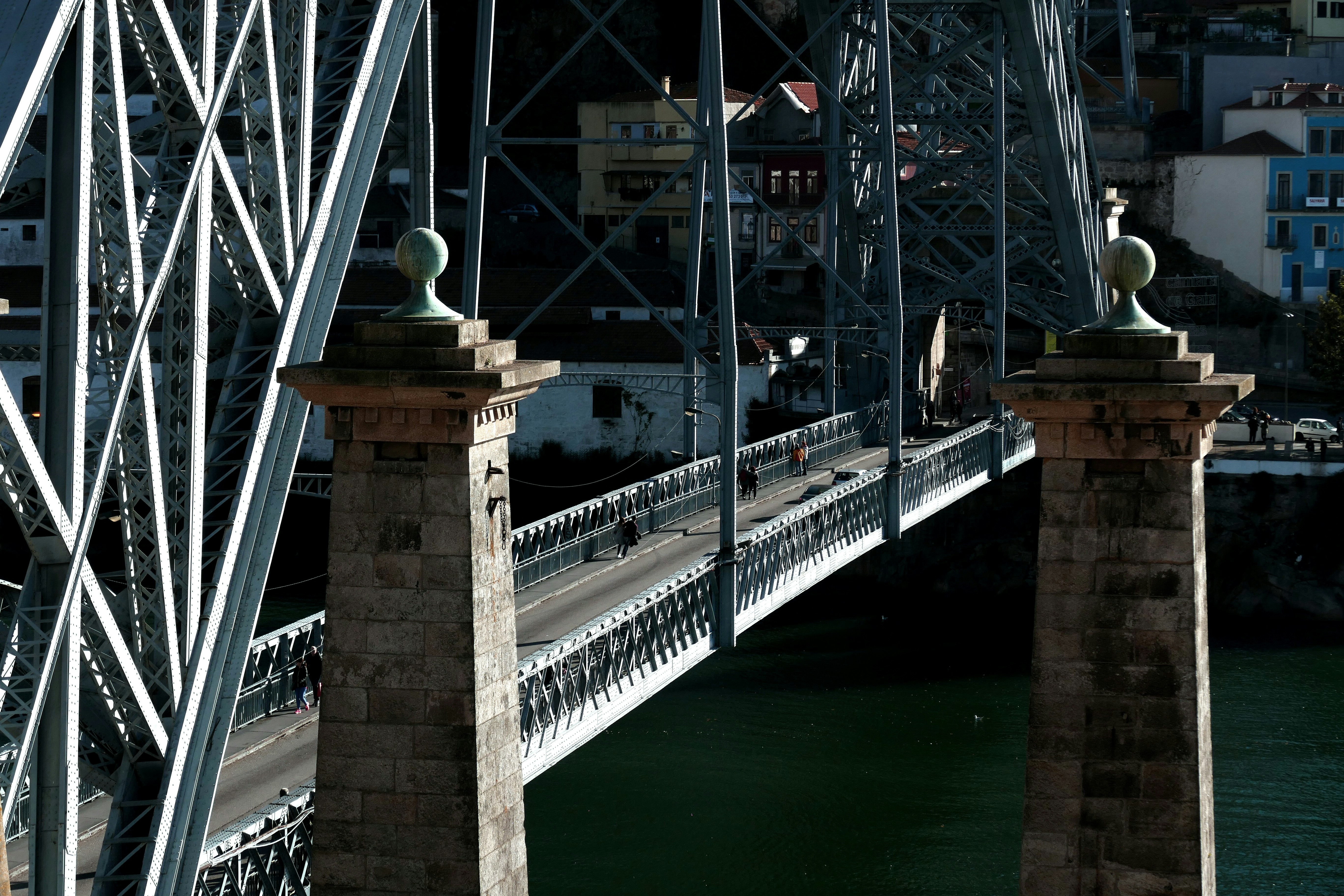 brown concrete bridge over river