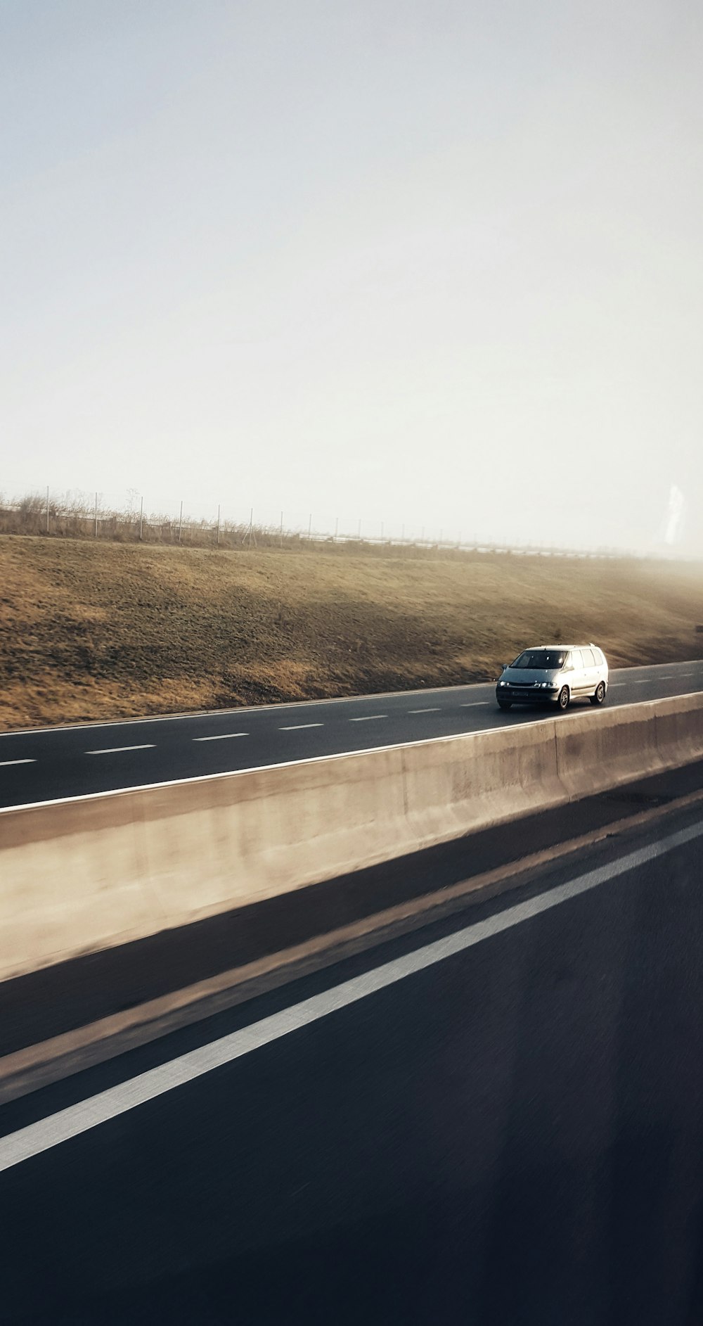 white car on road during daytime