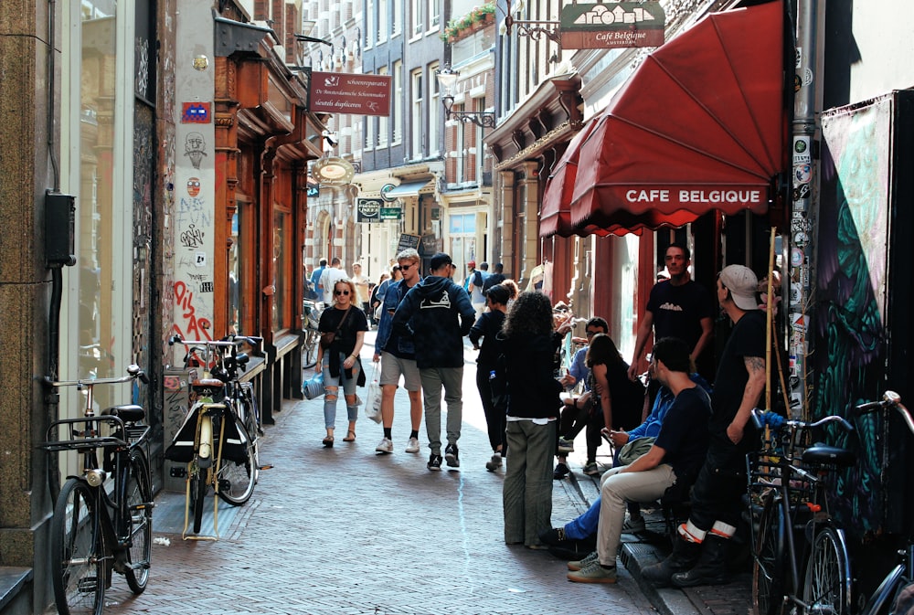 people walking on sidewalk during daytime