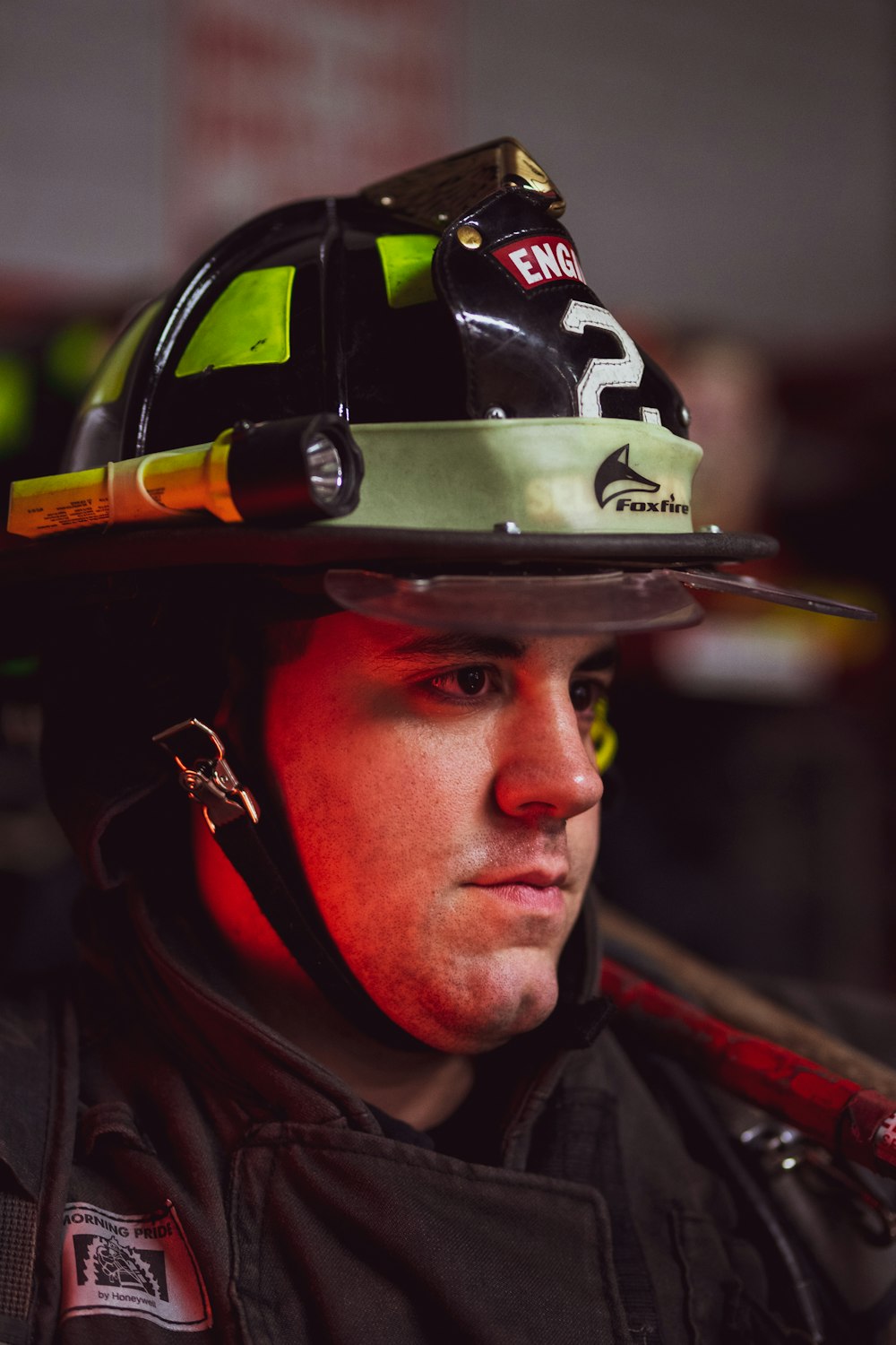 man in black and yellow helmet