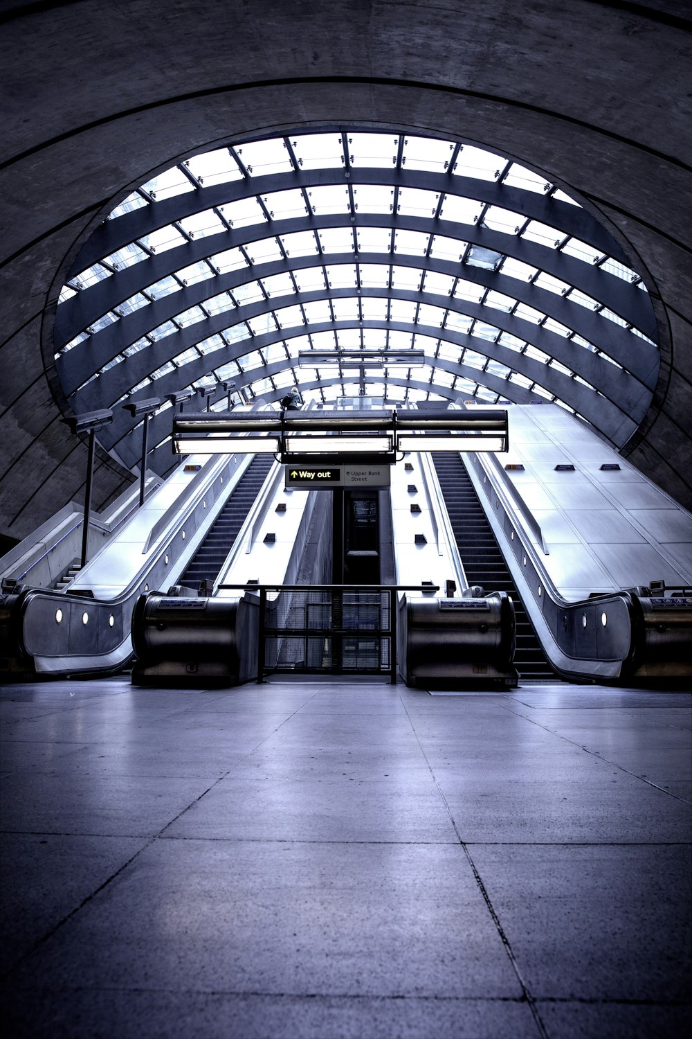 white and brown train in a building