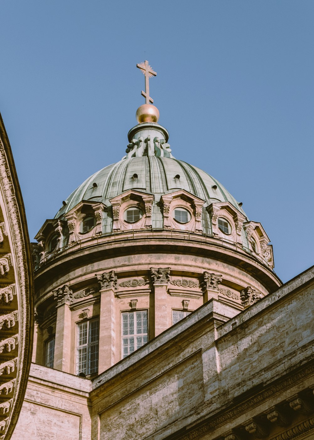 brown concrete dome building under blue sky during daytime