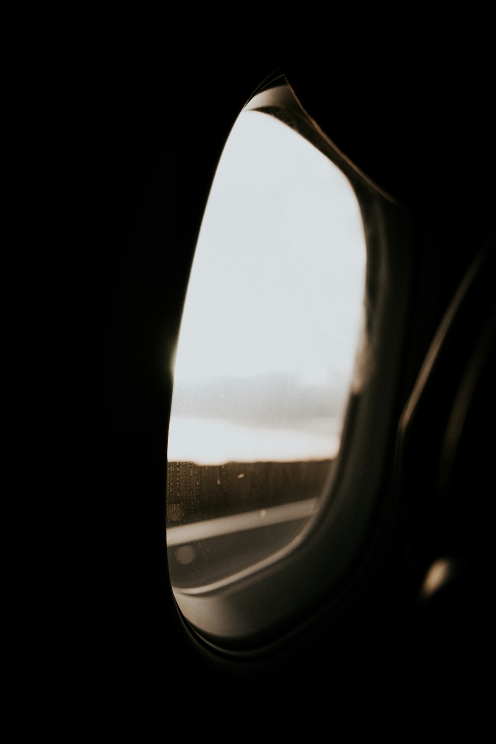 black car side mirror during daytime