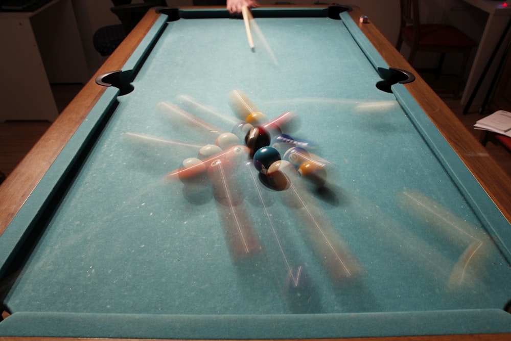 billiard balls on billiard table