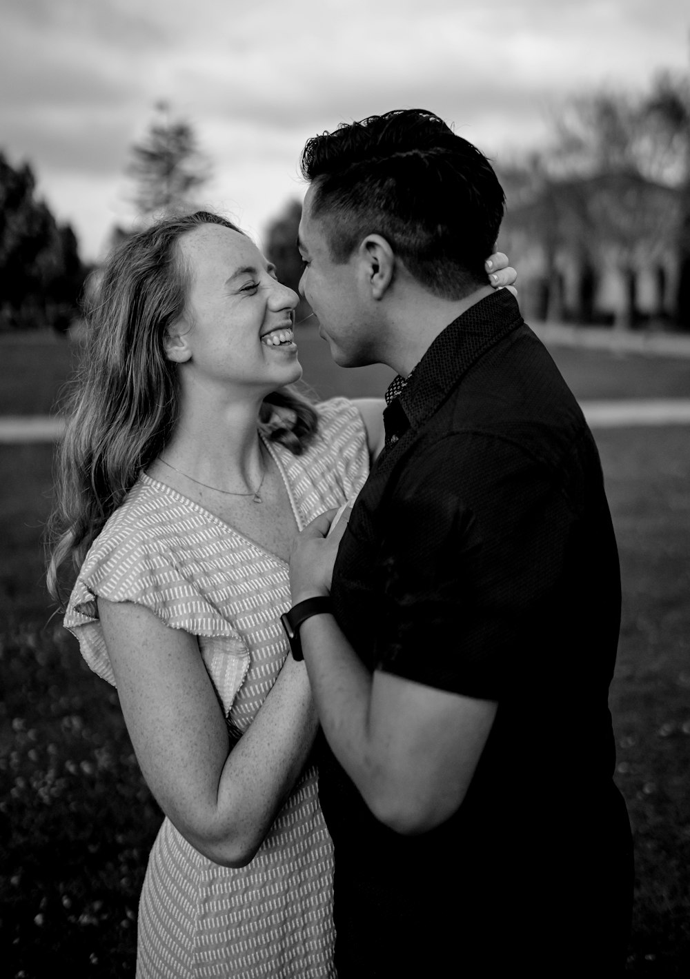 man kissing womans cheek