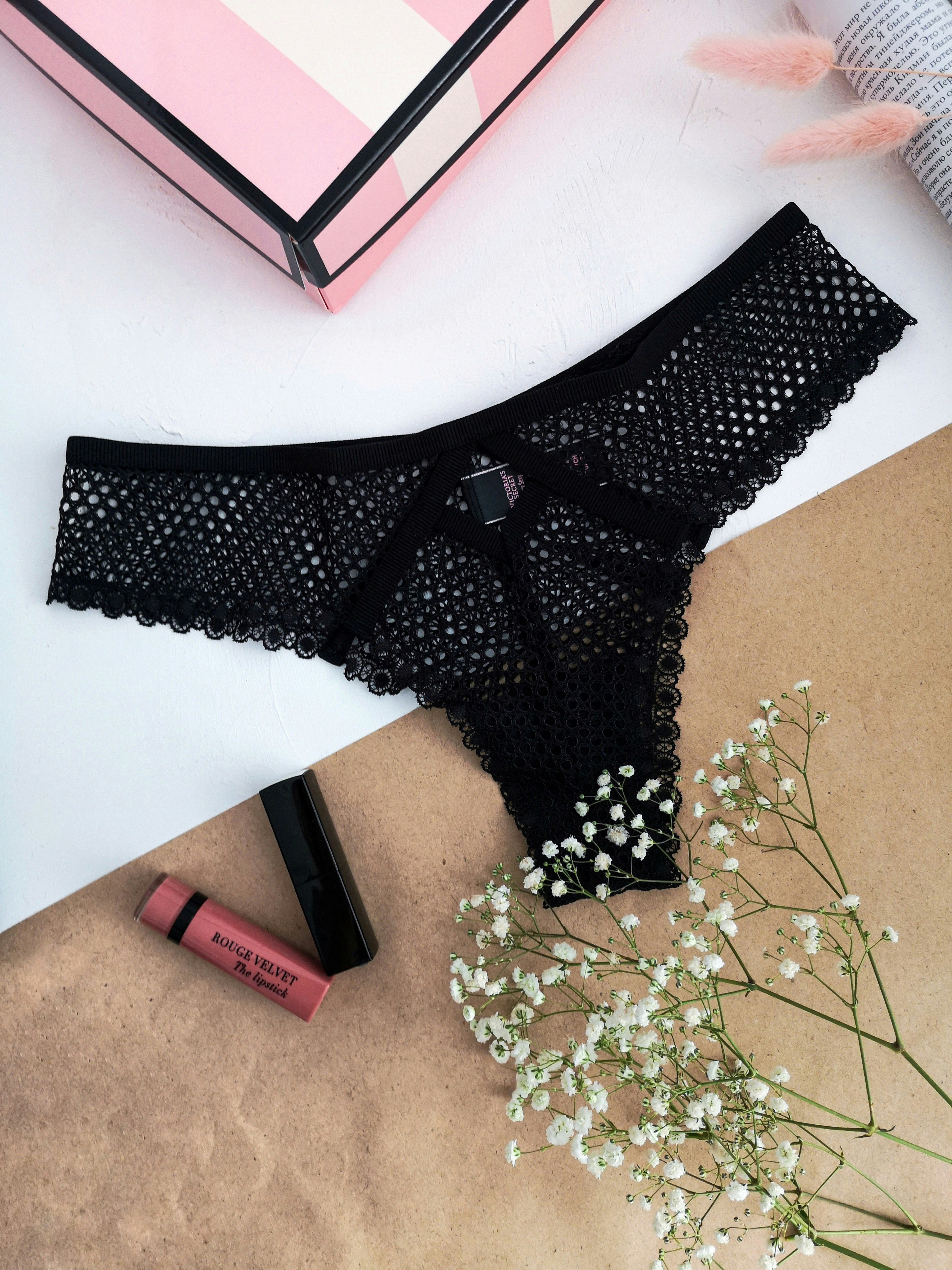 Black and white polka dot panty on white table photo Free Black Image on Unsplash