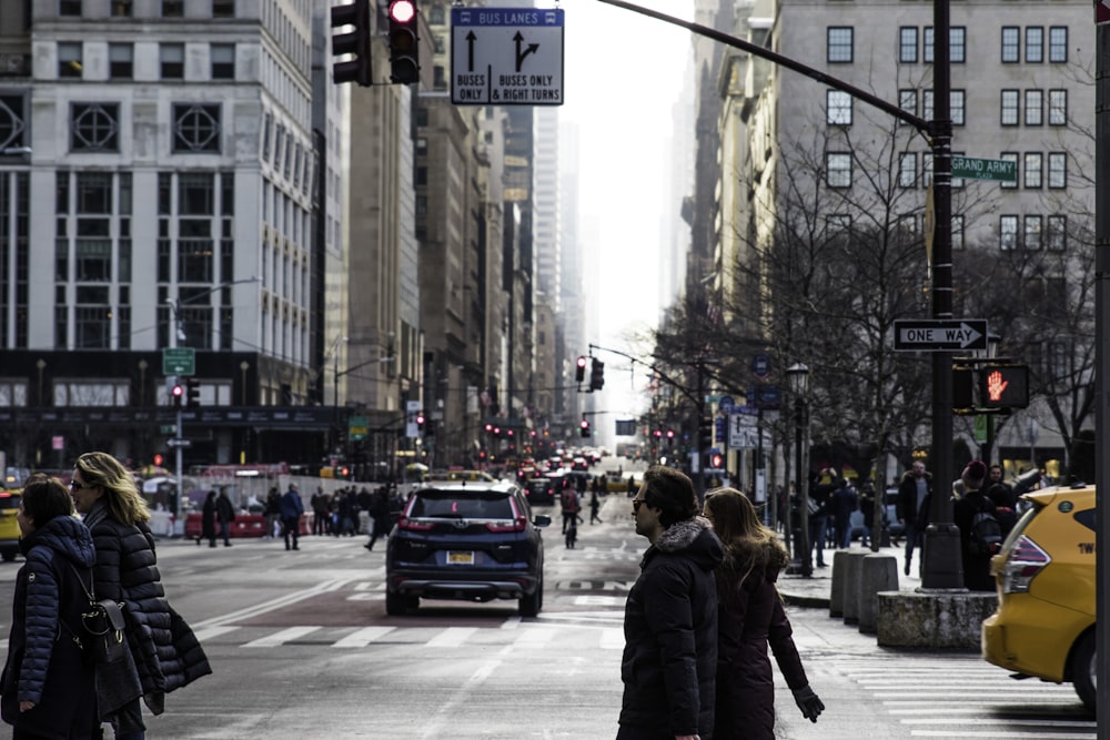 people walking on pedestrian lane during daytime