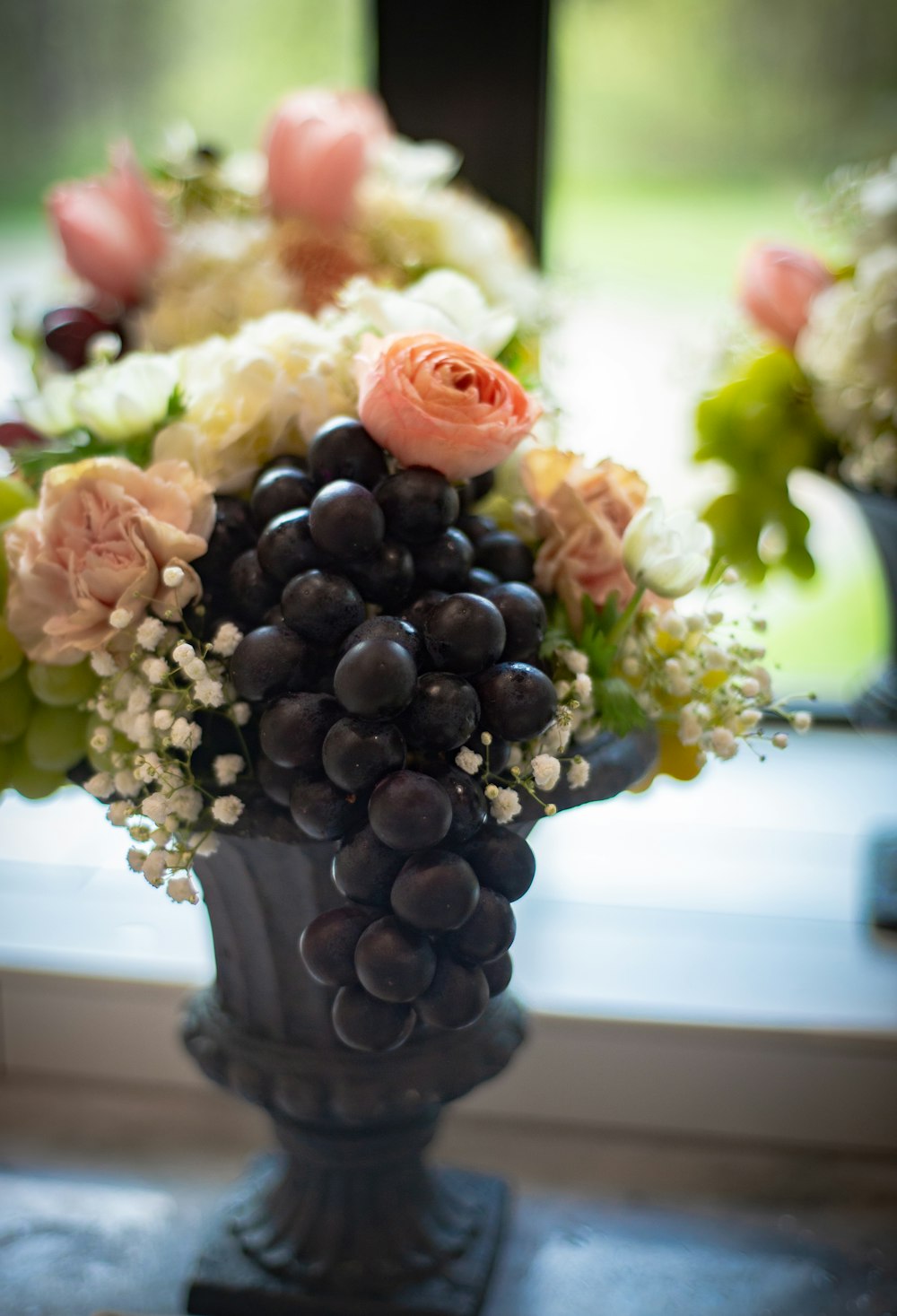 pink and white flowers in vase