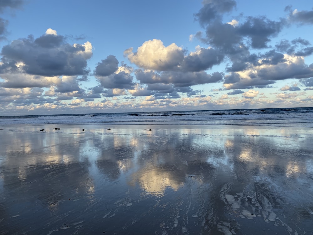 blue sky and white clouds over the sea