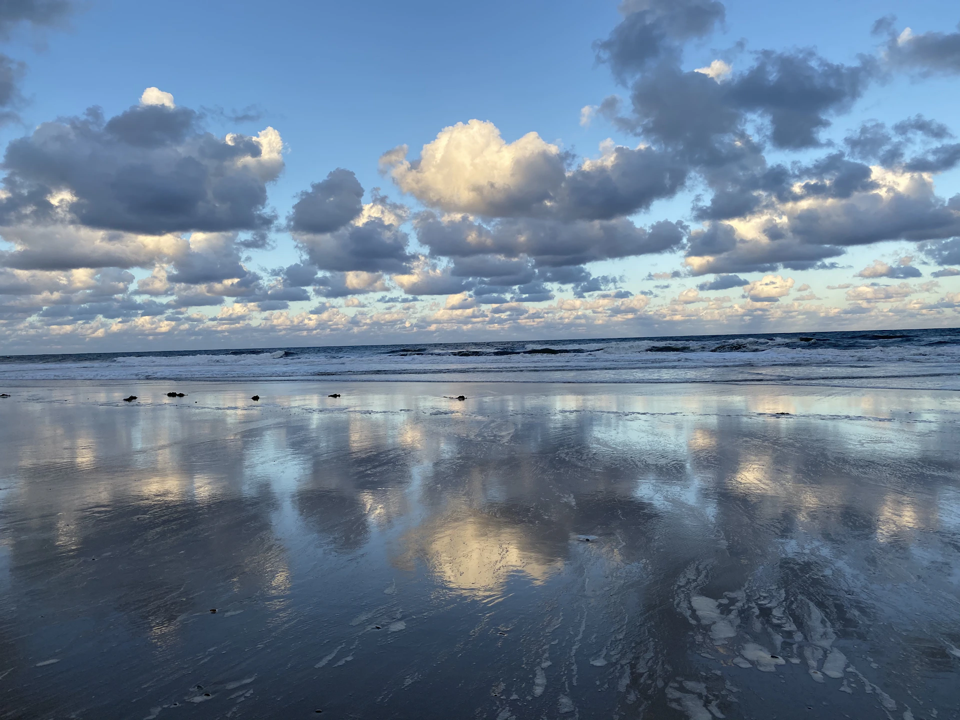 blue sky and white clouds over the sea
